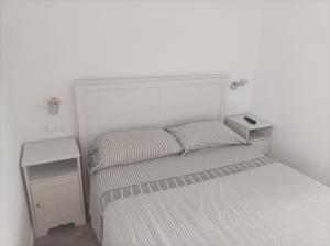 Una cama o camas en una habitación de Spirit of Costa Calma