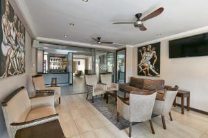 TV a/nebo společenská místnost v ubytování Regent Select Hotel