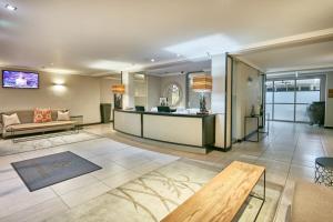 TV o dispositivi per l'intrattenimento presso Regent Select Hotel
