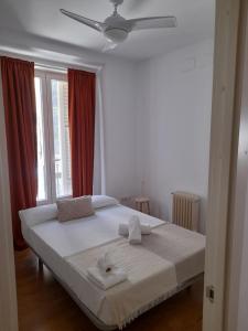 Postel nebo postele na pokoji v ubytování Espoz habitaciones + 16 fotografií