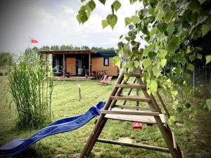 Vonkajšia záhrada v ubytovaní Cisy Resort-idealny dla gości ze zwierzętami,ogrodzony teren na wyłączność,150 m od jeziora