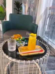 a table with a tray of food and a drink at 75 MOTEL in Ha Giang