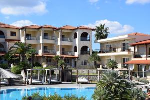 a view of a resort with a swimming pool at Blue Bay Halkidiki in Afitos