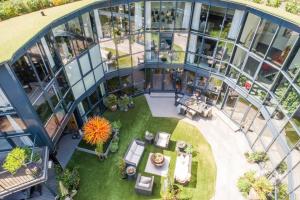 an overhead view of an apartment building with a courtyard at Woolbrook Reservoir, Sidmouth in Sidmouth