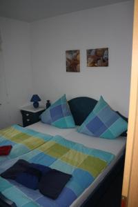Postel nebo postele na pokoji v ubytování Ferienwohnung 1066 App 3 in Tossens