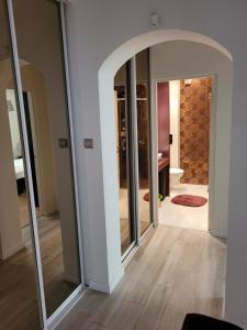 Łóżko lub łóżka w pokoju w obiekcie Apartament Kościuszki