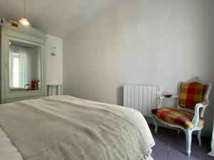 Postel nebo postele na pokoji v ubytování Casa Poliglota - 100m de la Cité Médiévale