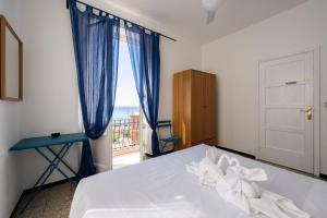 Voodi või voodid majutusasutuse Hotel Zoagli toas