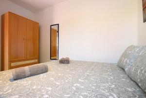 Ein Bett oder Betten in einem Zimmer der Unterkunft Casa Yoaki