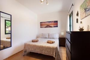 Ein Bett oder Betten in einem Zimmer der Unterkunft Casa Yoaki