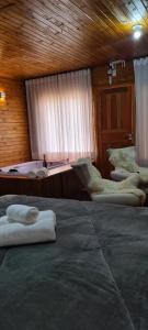Uma cama ou camas num quarto em Hospedaria Kayser Haus
