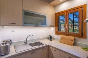 Kuchyň nebo kuchyňský kout v ubytování Carissa house in Crete