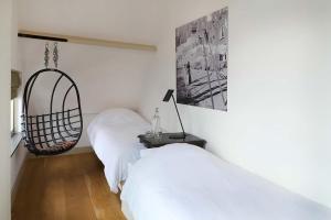 Ein Bett oder Betten in einem Zimmer der Unterkunft Hello I'm Local - Boutique Hostel