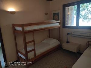 Posteľ alebo postele v izbe v ubytovaní A casa di Sognu