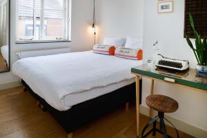 Ein Bett oder Betten in einem Zimmer der Unterkunft Hello I'm Local - Boutique Hostel