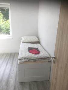 Postel nebo postele na pokoji v ubytování Apartmány U Pařezáče