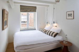 Ein Bett oder Betten in einem Zimmer der Unterkunft Hello I'm Local - Boutique Hostel