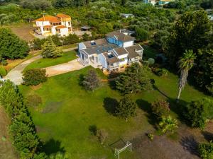 an aerial view of a house with a yard at Elea resort in Preveza