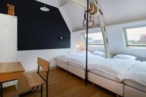 Ein Bett oder Betten in einem Zimmer der Unterkunft Hello I'm Local - Boutique Hostel