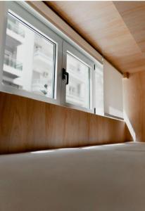 Een bed of bedden in een kamer bij Luxury Studio in the heart of Kolonaki