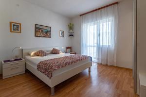 Postel nebo postele na pokoji v ubytování Apartments with parking spaces Jelsa, Hvar - 134