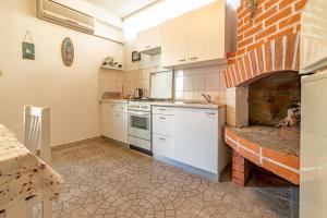 Kuchyň nebo kuchyňský kout v ubytování Apartments with parking spaces Jelsa, Hvar - 134