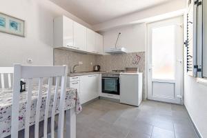 Kuchyň nebo kuchyňský kout v ubytování Apartments with parking spaces Jelsa, Hvar - 134