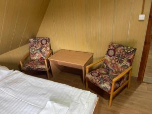 Ein Bett oder Betten in einem Zimmer der Unterkunft Chata Lucka