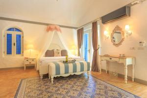 Postel nebo postele na pokoji v ubytování Flamingo Hotel & Spa - Pet Friendly