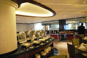 Veitingastaður eða matsölustaður á Raviz Center Point Hotel