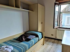 Ліжко або ліжка в номері Anima d'Orcia - Ampio appartamento in pieno centro storico!
