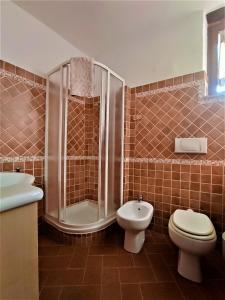 Ванна кімната в Anima d'Orcia - Ampio appartamento in pieno centro storico!