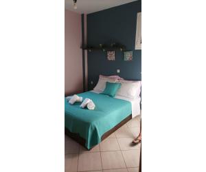 Postel nebo postele na pokoji v ubytování Rafaela Apartment