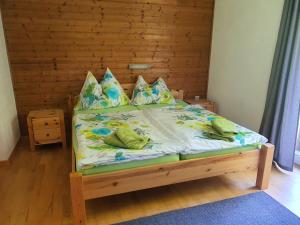 A bed or beds in a room at Landhaus Alexa
