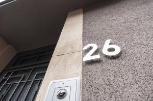 a building with the number on the side of it at The Queen Luxury apartments - Villa Giorgia in Dudelange