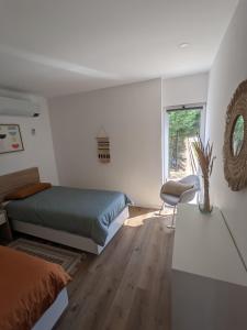Cama ou camas em um quarto em Entre Pomares