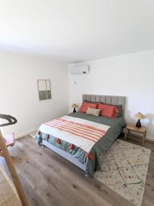 Cama ou camas em um quarto em Entre Pomares