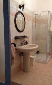 Koupelna v ubytování B&B La Rosa + 8 fotografií