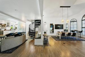 a living room with a couch and a table at ModernCompound in Scottsdale