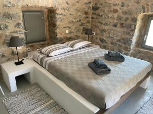 Postel nebo postele na pokoji v ubytování Soloterra tower