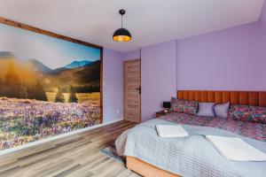 Postel nebo postele na pokoji v ubytování Dunajecko Dziupla + 18 fotografií