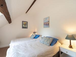 Postel nebo postele na pokoji v ubytování Holiday Home La Bachelotte by Interhome