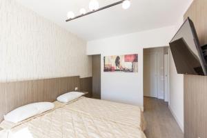 Posteľ alebo postele v izbe v ubytovaní Exclusive Suites Riva