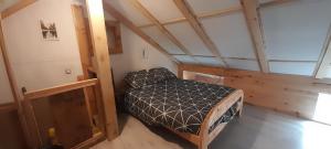 Posteľ alebo postele v izbe v ubytovaní Chalet au ayes