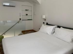Postel nebo postele na pokoji v ubytování AMECASA