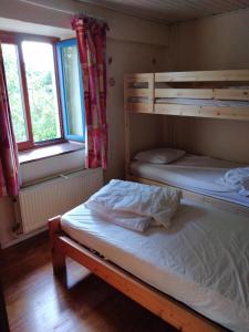 Gîte d'Hildegarde with sauna客房内的一张或多张床位