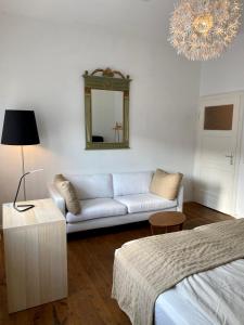 Postel nebo postele na pokoji v ubytování Kläve12 Guesthouse