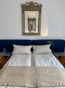 Postel nebo postele na pokoji v ubytování Kläve12 Guesthouse