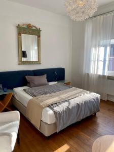 Postel nebo postele na pokoji v ubytování Kläve12 Guesthouse