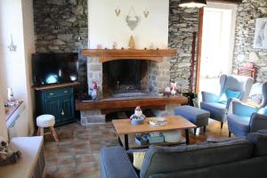 Posezení v ubytování Très belle maison typique proche de Saint-Lary